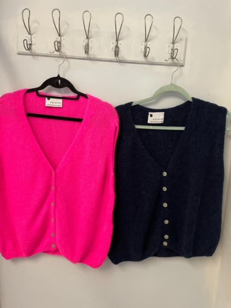 Neon pink alpaca sleeveless buttoned top
