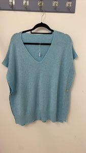 Button side sleeveless poncho jumper pale blue